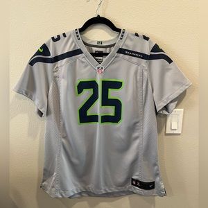 Seahawks on field Richard Sherman jersey